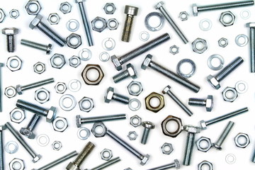 Various bolts, nuts, and washers on white background.