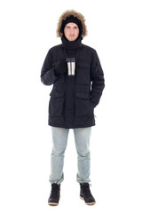 young attractive man in black winter jacket with mug of coffee i