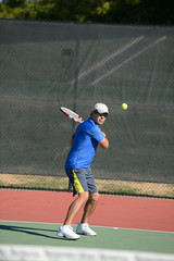 Hispanic Man Playing Tennis