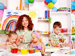 Child playing plasticine.