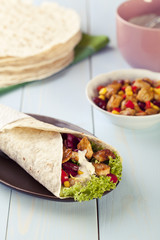 tortilla wraps with meat and vegetables
