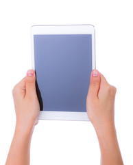 Woman hand using a touch screen device against white background