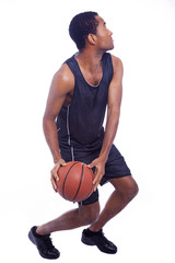 Basketball player ready to jump, isolated on a white background