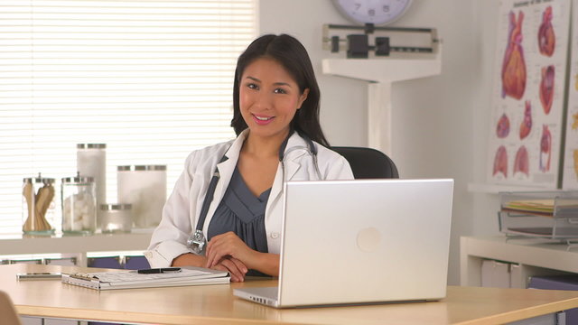 Successful Japanese doctor in her office