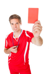Soccer Referee Showing Red Card