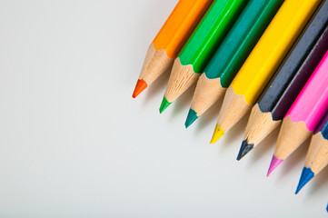 Variety of wooden color pencils isolated on white background