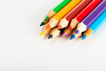 Variety of wooden color pencils isolated on white background