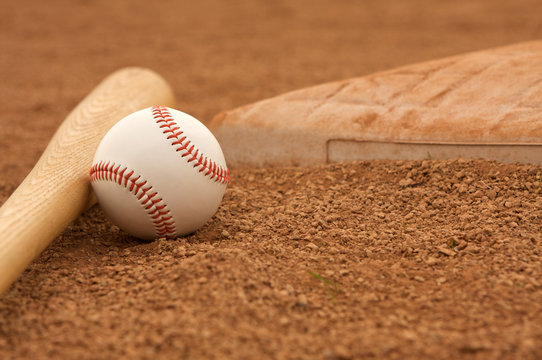 Baseball & Bat near a base