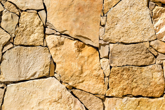 Yellow Stone Wall Background