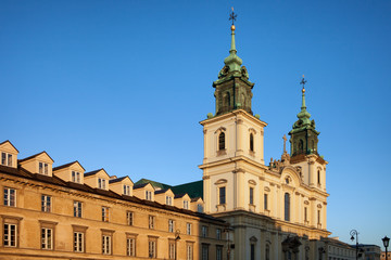 Fototapeta na wymiar Church of the Holy Cross and Tenement Houses in Warsaw