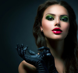 Beauty Fashion Glamour Girl. Vintage Style Model Wearing Gloves