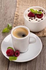 Coffee and cream dessert with raspberries
