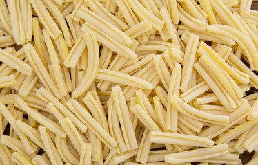 Spilled raw casarecce pasta