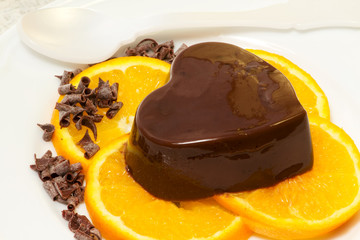 chocolate pudding over orange slices