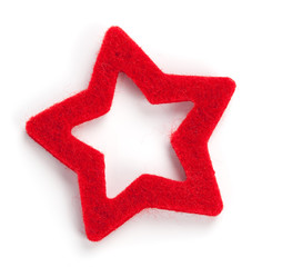 Red star shaped christmas decoration, on white