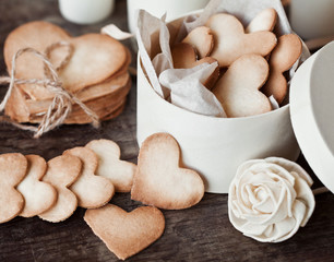 Breakfast Cookies in the Shape of Hearts on morning wooden table