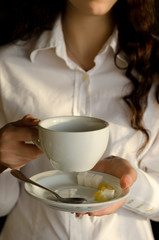 Girl with a cup of tea.