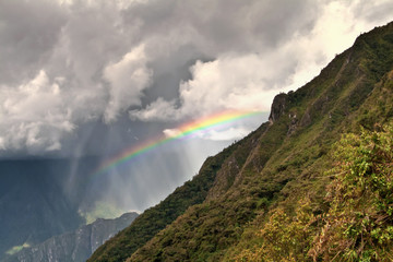 Rainbows in the mountains of Machu Picchu, Cusco, Peru © poladamonte