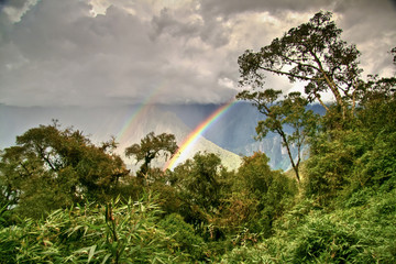 Rainbows in the mountains of Machu Picchu, Cusco, Peru © poladamonte