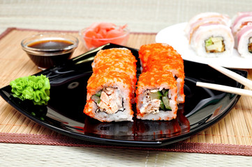 Japanese rolls with masago caviar, cheese and cucumber