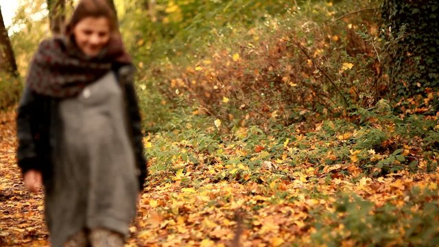 fashion woman walk with dog in park