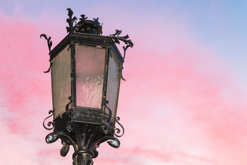 Fototapeta na wymiar Old stylish lamp. Street of Warsaw capital of Poland.