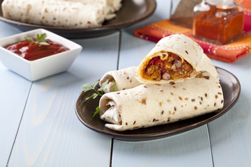burritos wraps with meat beans and vegetables