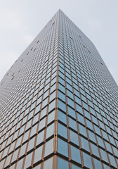 Fototapeta na wymiar modern glass and steel office building in Beijing, China