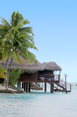 Reef Bungalows over tropical coral reef