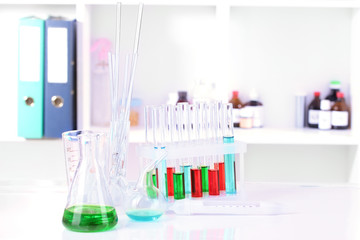Different laboratory glassware with color liquid