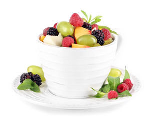Fruit salad in cup isolated on white