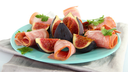 Tasty figs with ham, isolated on white