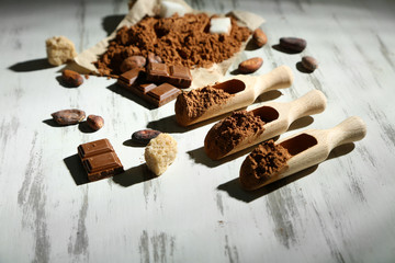 Cocoa powder on wooden table