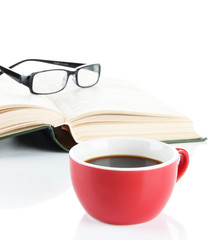 Naklejka premium Cup of coffee with book and glasses isolated on white