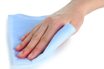 Hand wiping surface with blue rag isolated on white