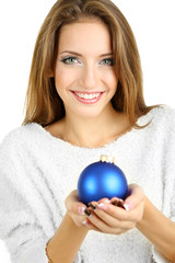 Beautiful smiling girl with Christmas toy isolated on white