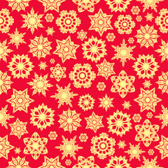 Fototapeta na wymiar Christmas background.seamless pattern of golden snowflakes on a