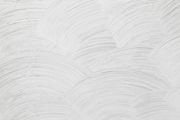Closeup white concrete wall texture with round plaster decorativ