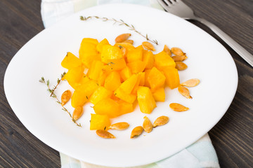 Baked pumpkin with olive oil and thyme