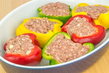 Stuffed peppers in oven dish ready for cooking