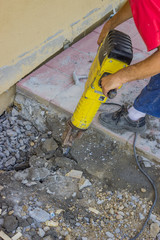 Builder worker with electric jackhammer 4