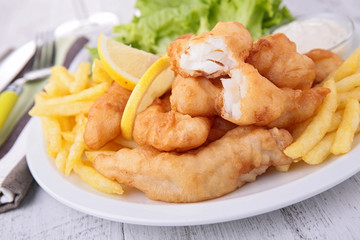 fish and chips with salad and sauce
