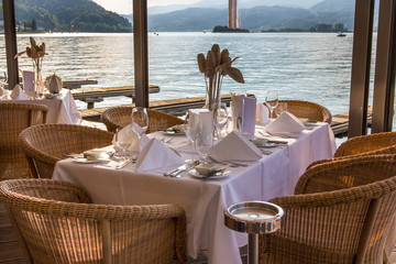 Luxurious restaurant with tables on pier