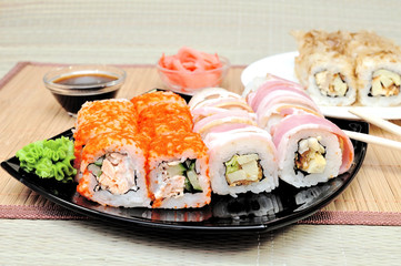 Japanese rolls with masago caviar, cheese and cucumber
