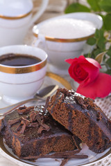 delicious traditional homemade cake with rose and coffe