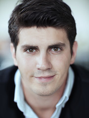 Portrait of smiling businessman in the office, close-up