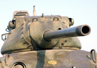 Fototapeta na wymiar Military tank captured in war kept in public road as memorial in Hyderabad,India