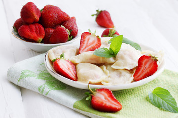 Dumplings with fresh strawberries