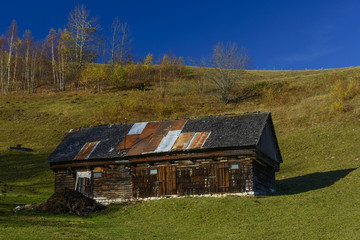 Fototapeta na wymiar Old house located on the top of the Carpathian Mountains