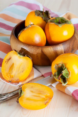 Persimmons in bowl